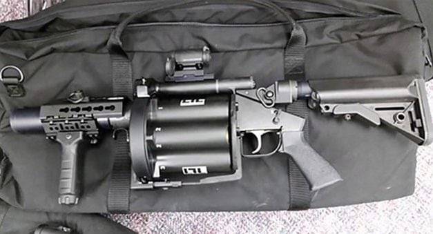 Grenade Launcher Falls Out of Police Truck, Member of the Public Returns It
