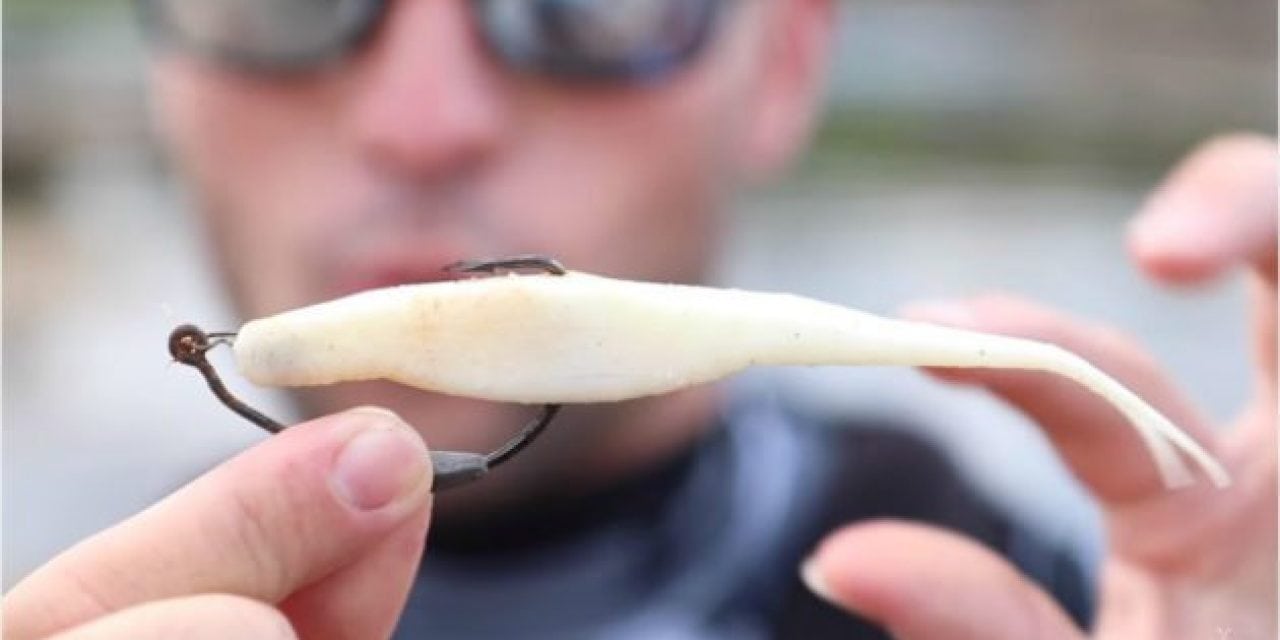 Watch This Guy Go Fishing with Crusty Lost Lures Found on the River Bottom
