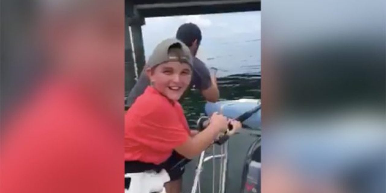 When You See What This Young Fisherman Caught, You’ll Totally Get the Smile