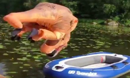 Watch a T-Rex Show You the Proper Way to Board a Raft