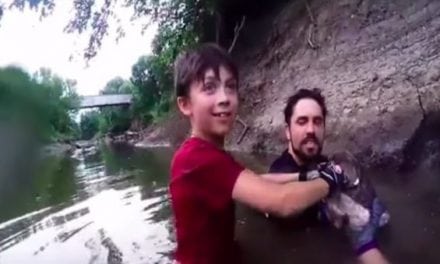 Young Noodler Pulls Catfish Bigger Than Him Out of a Cave