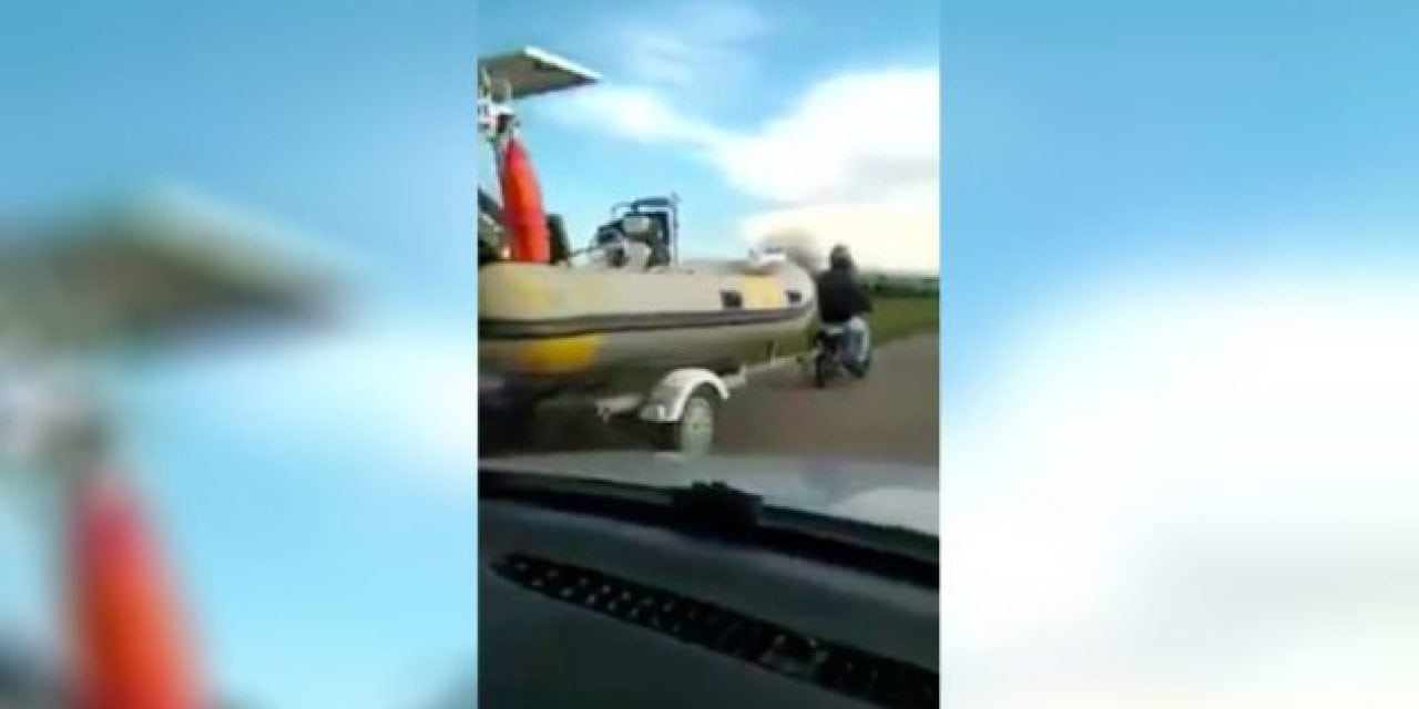 Video: That Moment When You Get Passed by a Mini-Bike Towing an Inflatable Boat