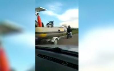 Video: That Moment When You Get Passed by a Mini-Bike Towing an Inflatable Boat