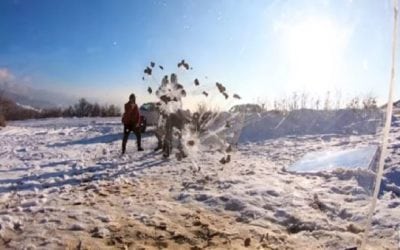 Would You Stand Behind Bulletproof Glass and Let Your Buddy Shoot at You?