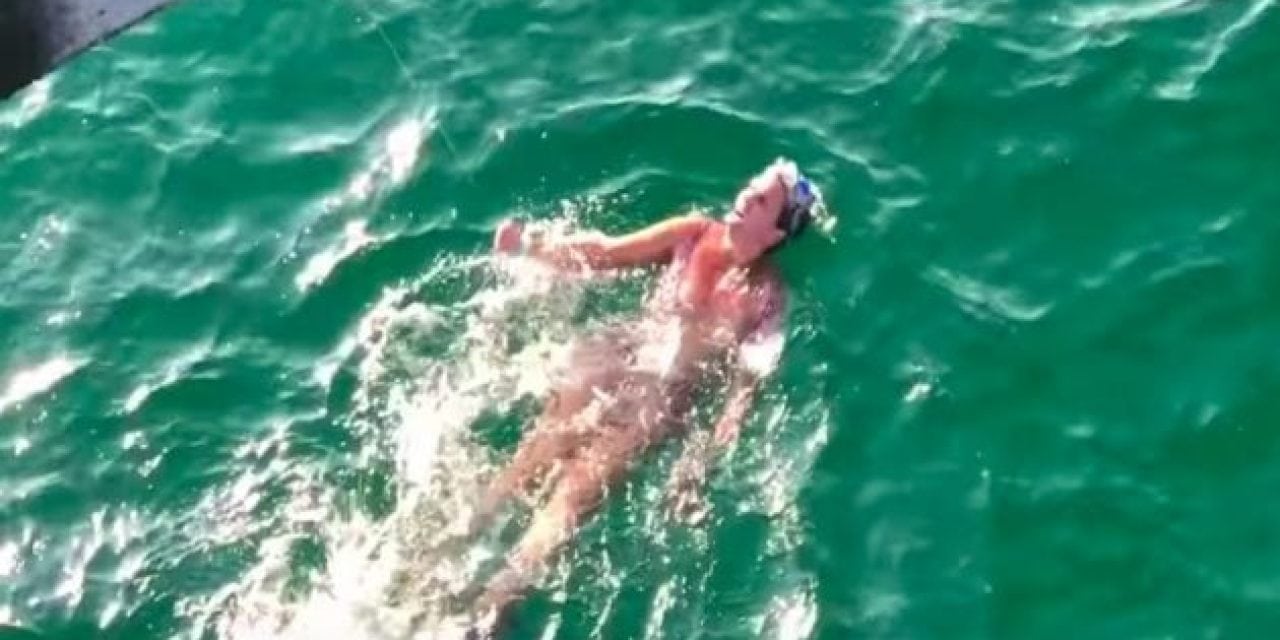 Video: Is This Lady Swimming Under a Fishing Pier Drunk?