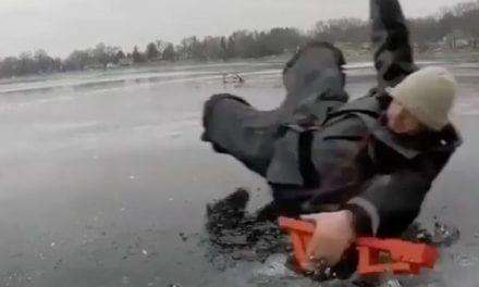 Video: Ice Fisherman Slides Across Ice Trying to Save Rod