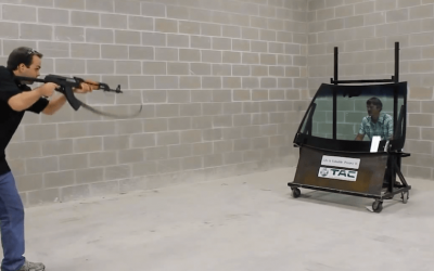CEO Stares Down an AK-47 Through Bulletproof Glass to “Stand Behind” His Product