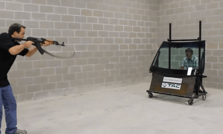 CEO Stares Down an AK-47 Through Bulletproof Glass to “Stand Behind” His Product