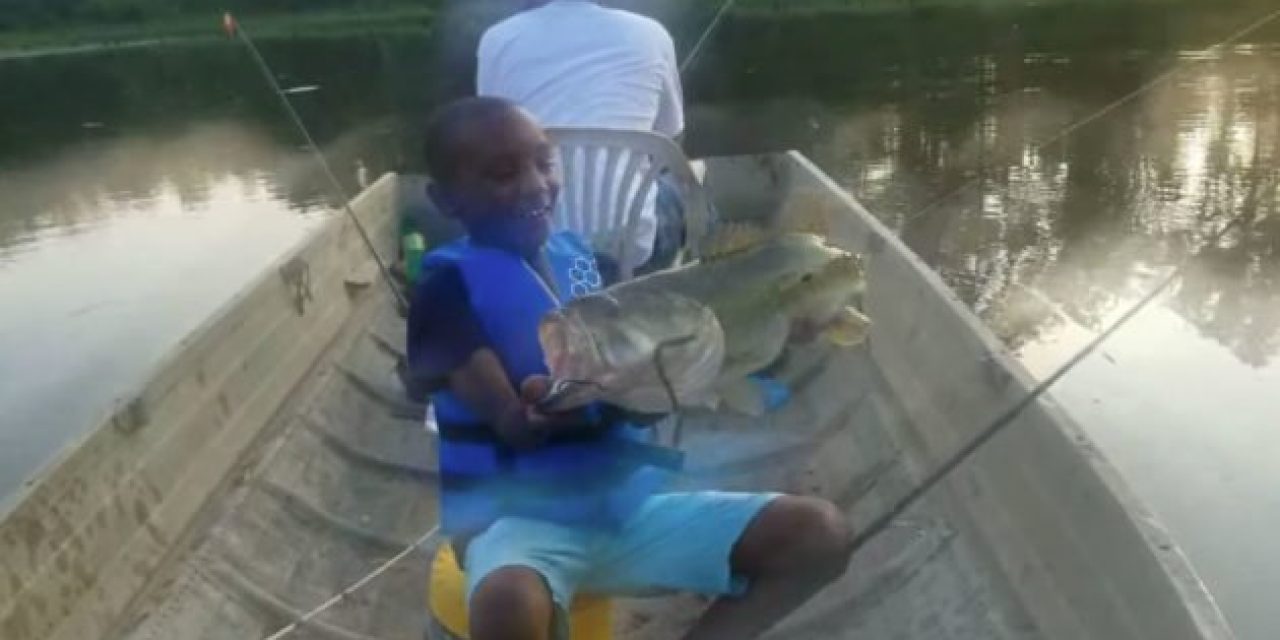 Young Man Lands Monster Bass on Memorial Day Weekend