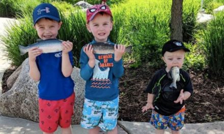 This Kid is Redefining the Grip-and-Grin Fish Photo Technique