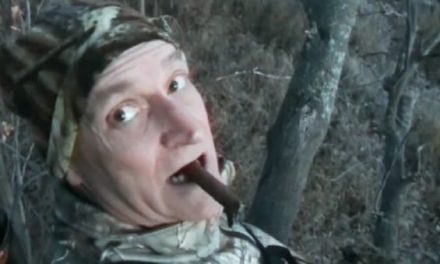 Hunter Smokes a Coyote While Savoring a Cigar