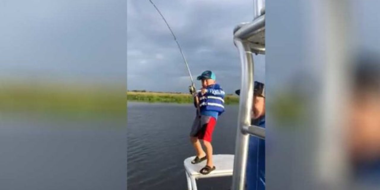 This Youngster Dominates a Huge Redfish in a Battle He’ll Remember Forever
