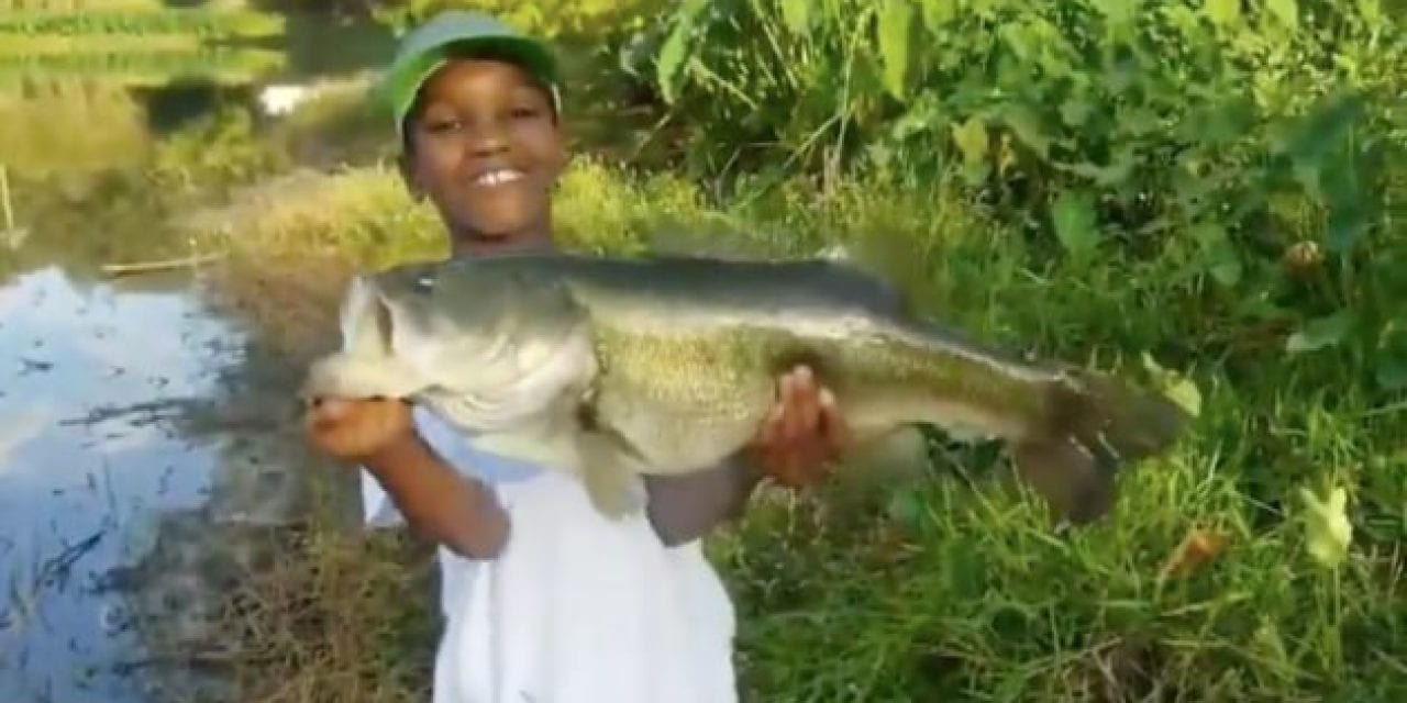 Little Man Sets an Example After Landing a Monster Bass