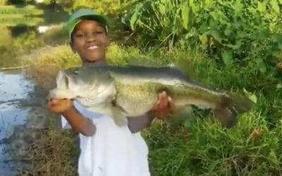 Little Man Sets an Example After Landing a Monster Bass