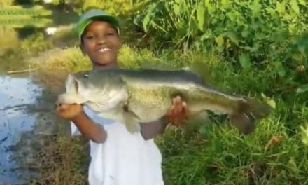 Little Man Sets an Example After Landing a Monster Bass