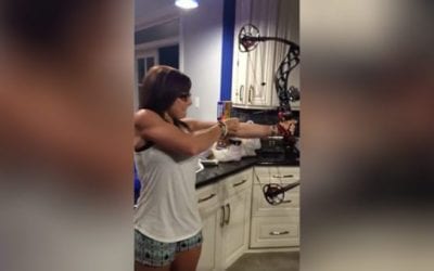Man Quickly Regrets Sticking His Head Inside a Drawn Compound Bow