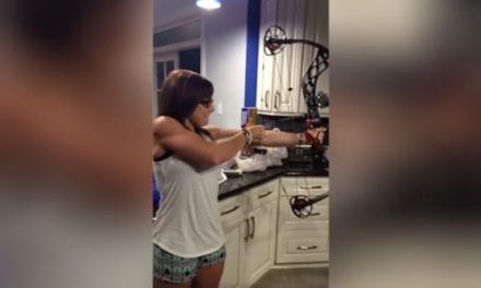 Man Quickly Regrets Sticking His Head Inside a Drawn Compound Bow
