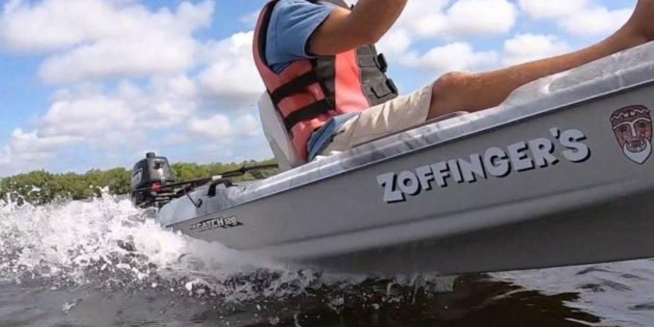 Man Installs a 5HP Outboard Motor on a Kayak