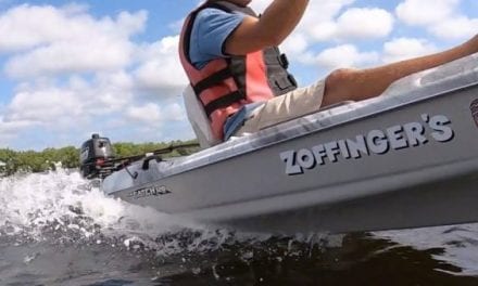 Man Installs a 5HP Outboard Motor on a Kayak