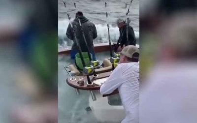 Crazy Angler Keeps Reeling in Big Fish Despite Rough Seas