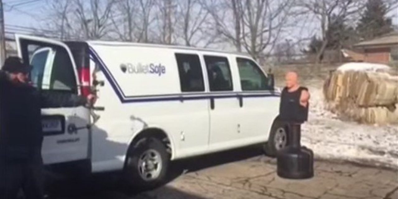 Two Guys Conduct Test to See If a Bulletproof Vest Will Stop an Arrow