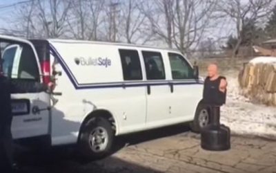 Two Guys Conduct Test to See If a Bulletproof Vest Will Stop an Arrow