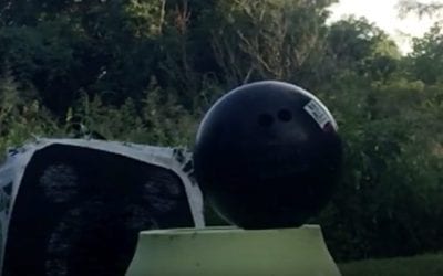 Man Attempts to Shoot Bowling Ball With Compound Bow