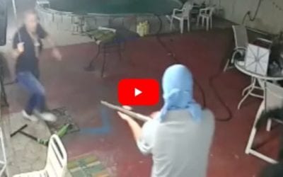 Man Drives Away 3 Armed Robbers with Machete in Wild Security Cam Footage