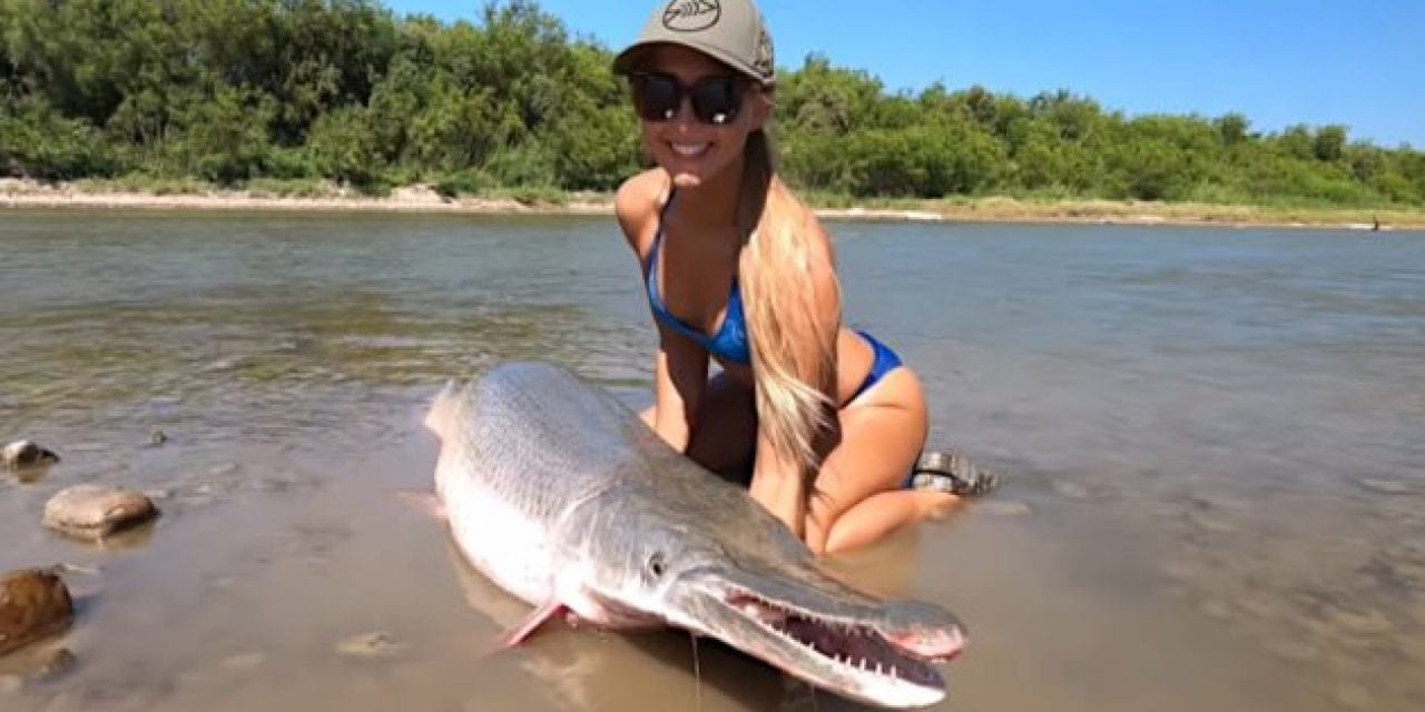 Woman Boats Giant Rio Grande Alligator Gar That is Bigger Than Her