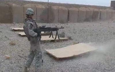 Soldier Dual-Wields M240 Machine Guns During Range Time