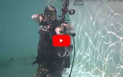 Archer Tests the Effectiveness of a Compound Bow Underwater
