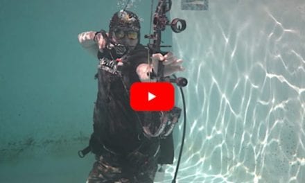 Archer Tests the Effectiveness of a Compound Bow Underwater