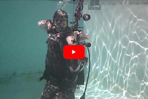 Archer Tests the Effectiveness of a Compound Bow Underwater