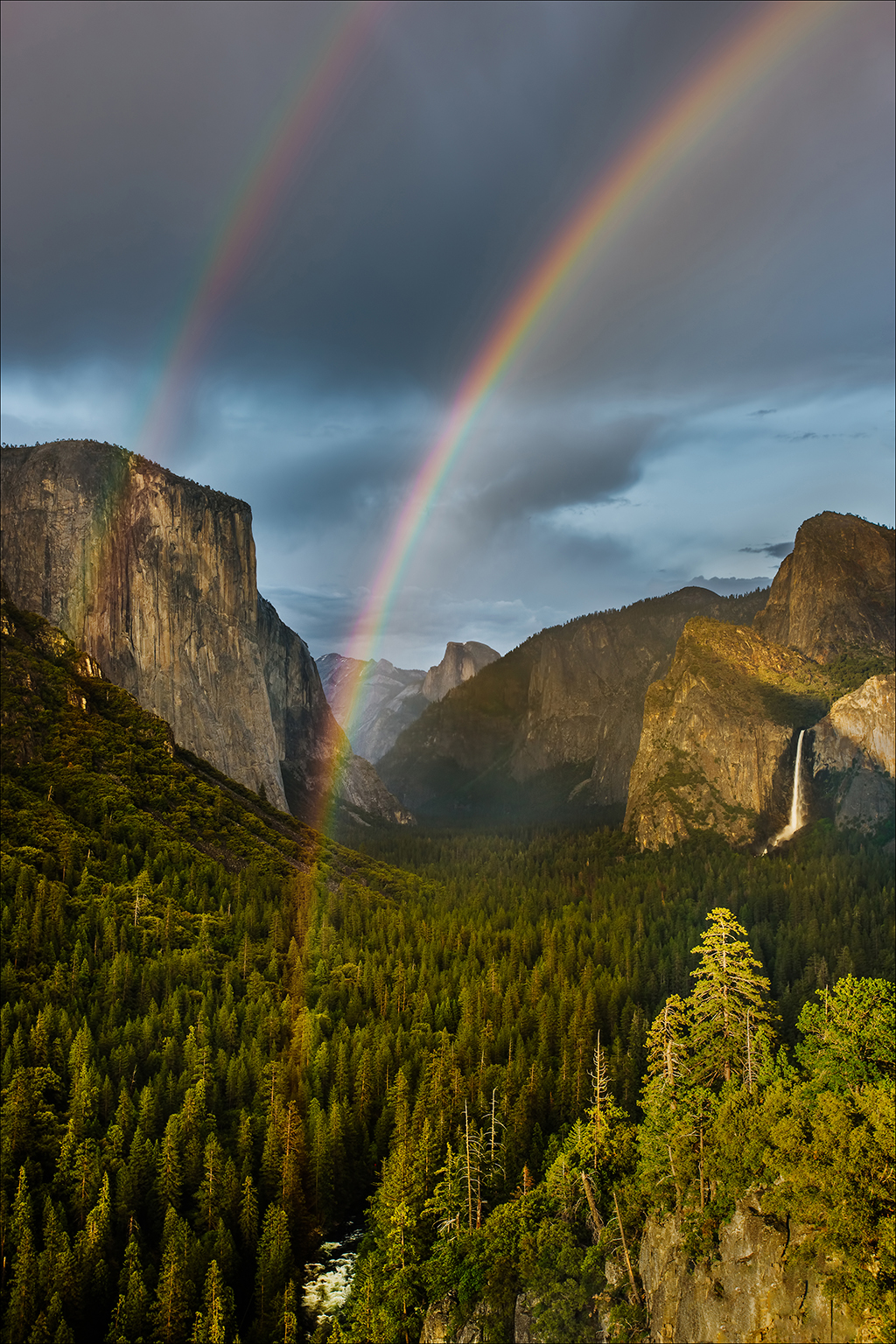 Image of a double rainbow after a lightning storm.