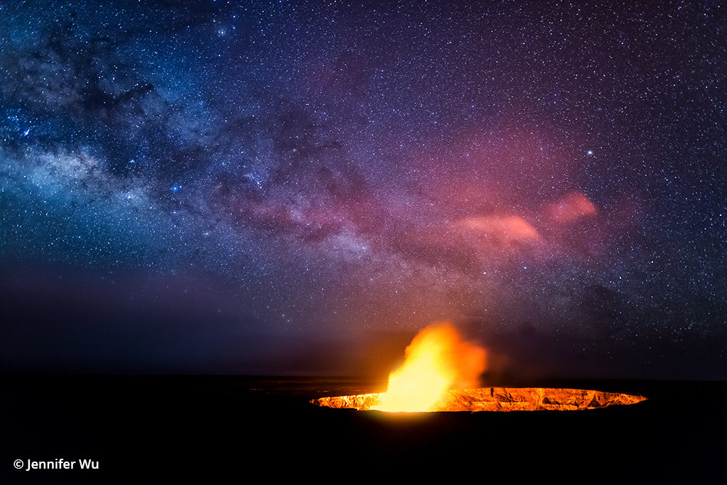 Image of a volcano below the Milky Way.