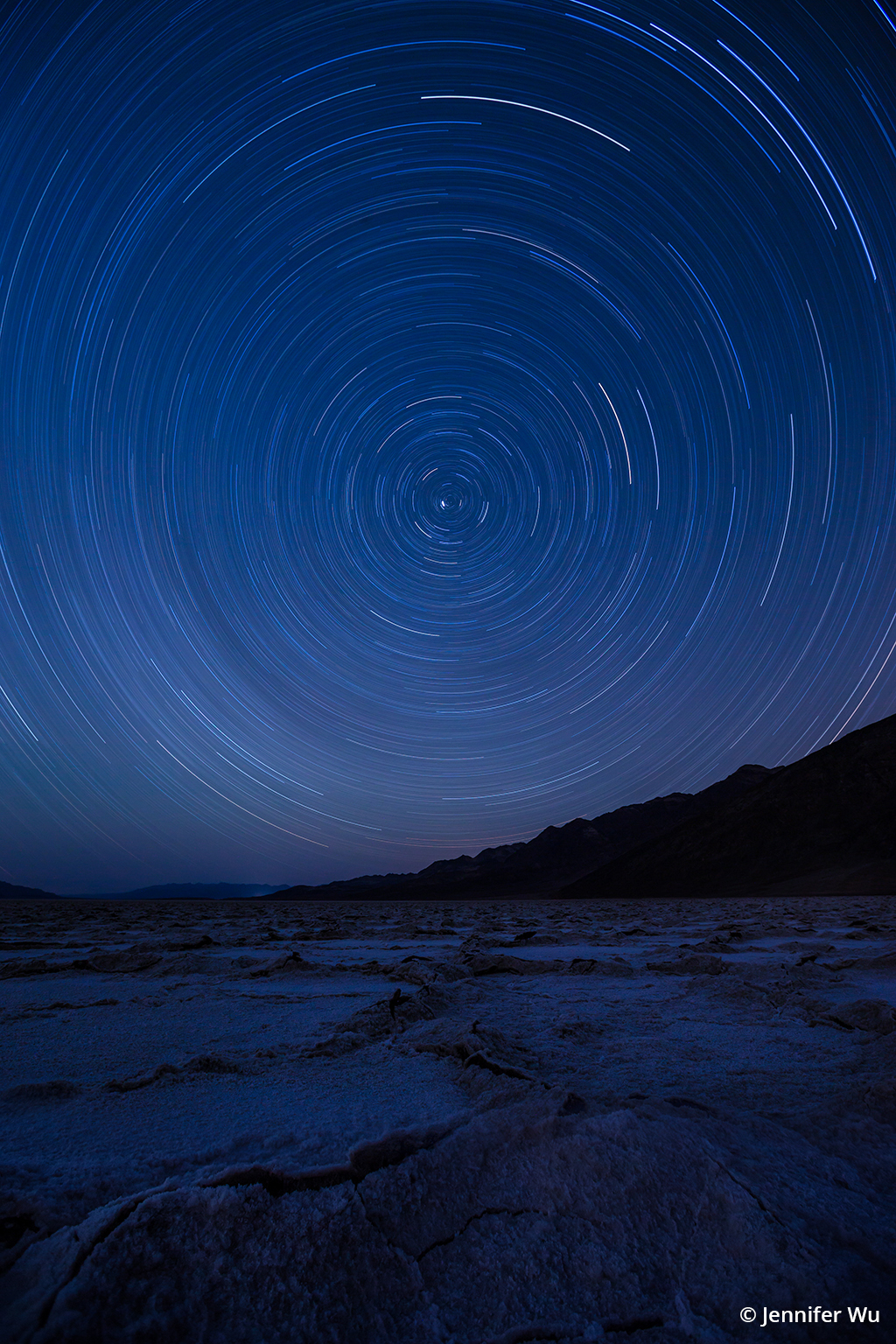 Image of star trails above Badwater.