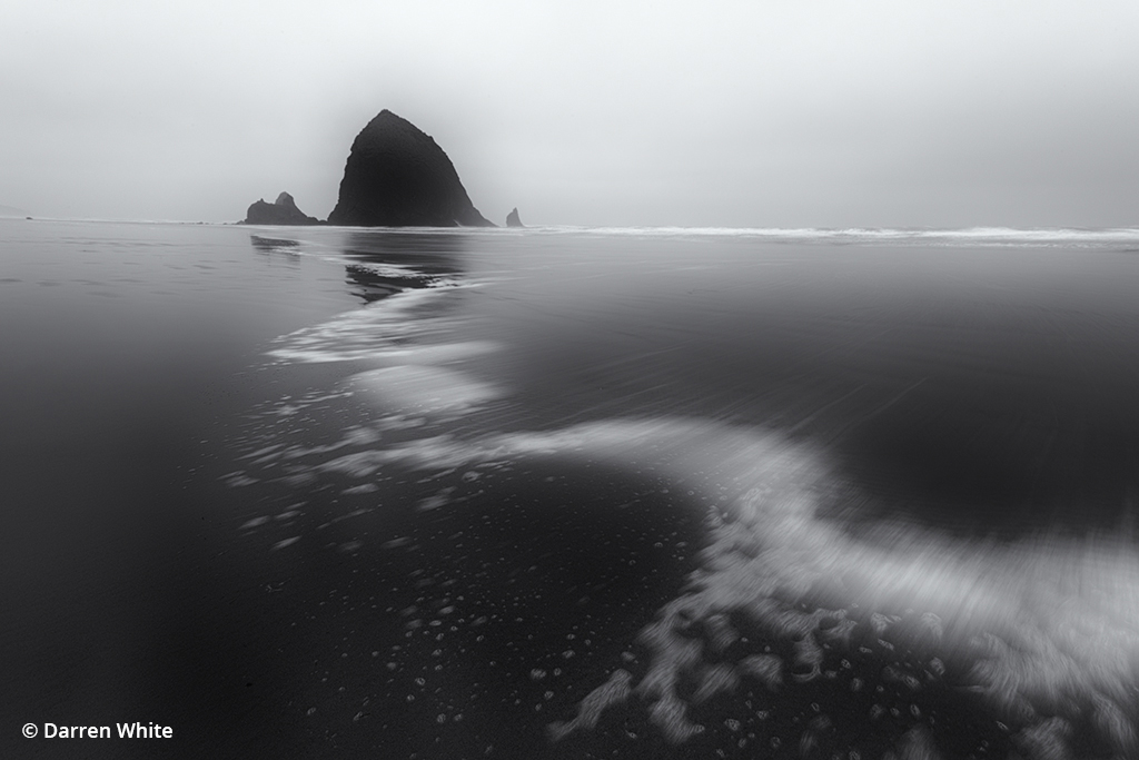 Monochrome photograph “Haystack Winds.”