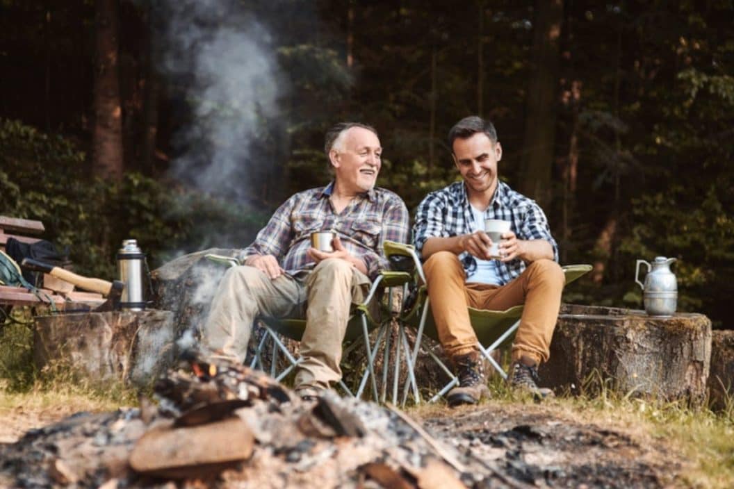 dad camping with adult son