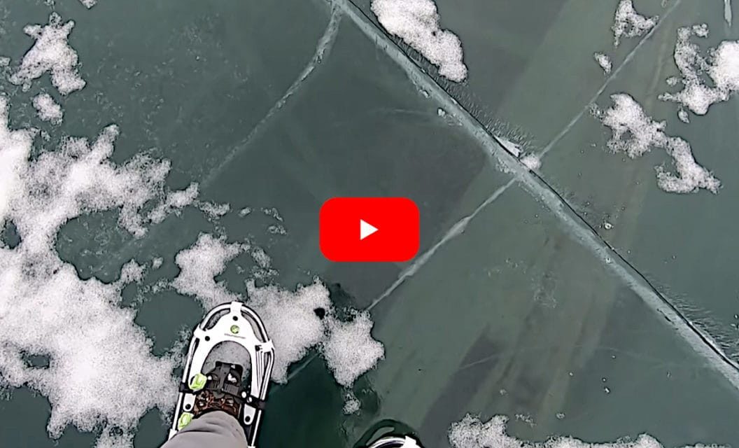 Ice Fisherman Spots Shipwreck Through Crystal Clear Ice and Catches a Fish Off It