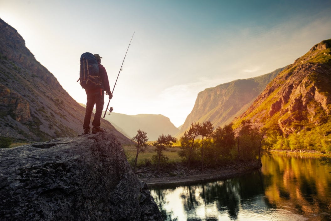 Hiker stands on the rock