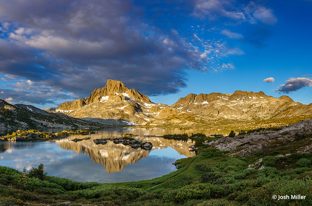 Photo of a lake and mountain peaks in the Sierra Nevada