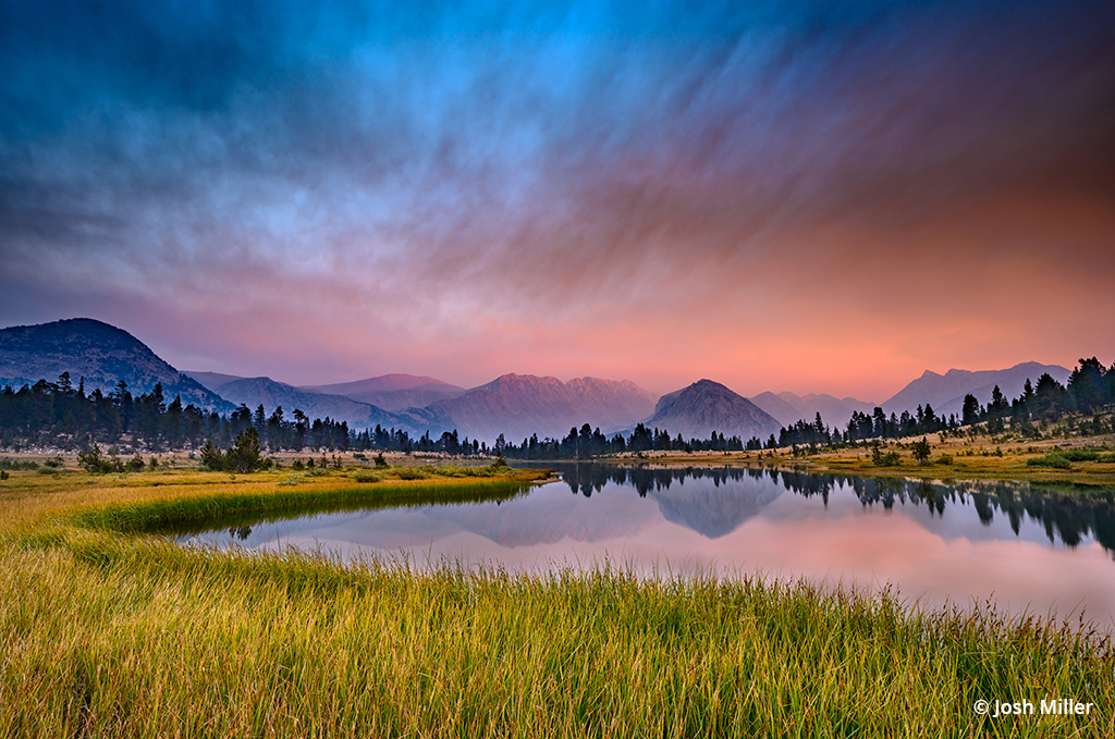 Photo of a sunset over a lake in the Sierra Nevada