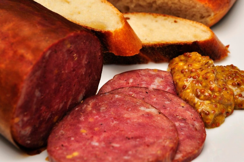picture of venison sausage with bread and mustard