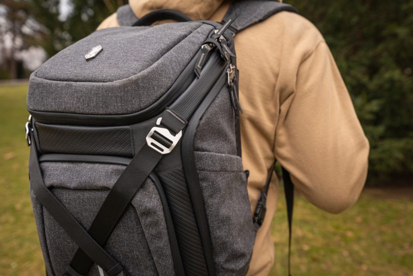 Photo of the K&F CONCEPT Alpha backpack on a photographer's back