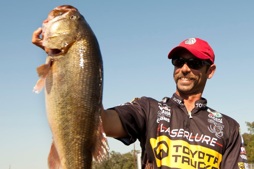 Angler Mike Iaconelli shows off his big catch during the Toyota Texas Bass Classic at Lone Star Convention Center & Expo Center in Conroe, Texas on October 2, 2010.