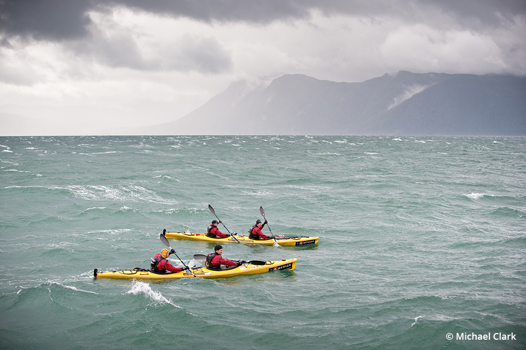 Sea kayaking photography example showing a racing team